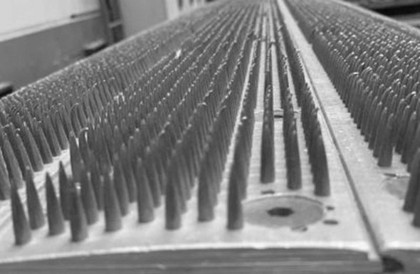 Needle roller of a shredding machine for textile recycling