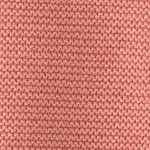 Nahaufnahme eines disana Strickstoffs aus Bio-Merinowolle in der Farbe Softpink mit charakteristischem Links-Linksstrick